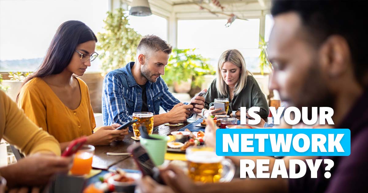 crown of people dining on their phones